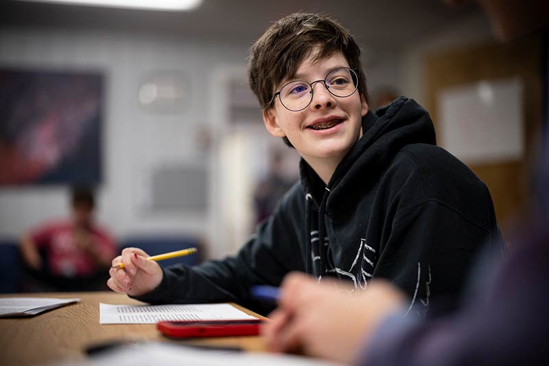 Happy boy in class