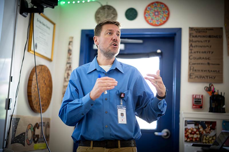 Teacher talking to class